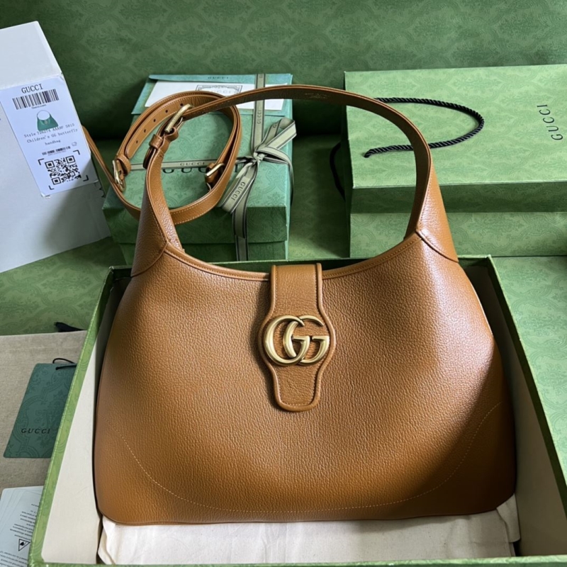 G*u*i top handle bags